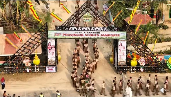 Welcome march beneath the jamboree arch