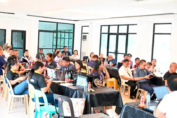 LGU department heads, PNP and BFP representatives seated at the jamboree coordination meeting